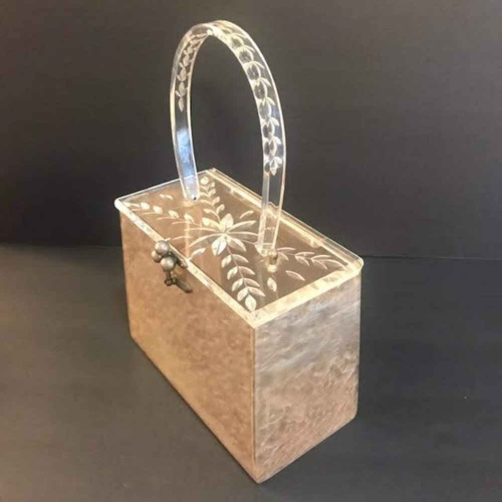 Beautiful carved Lucite handbag from the 50's